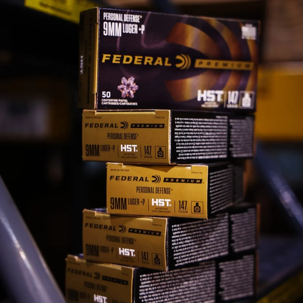 Boxes of P9HST4G federal hst 9mm +p-147gr on a warehouse metal stairs at target sports usa exclusive